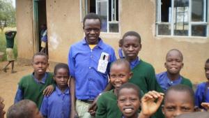 Enthusiastic school children outside the new classroom.